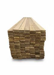 Stack of wooden planks on a white background