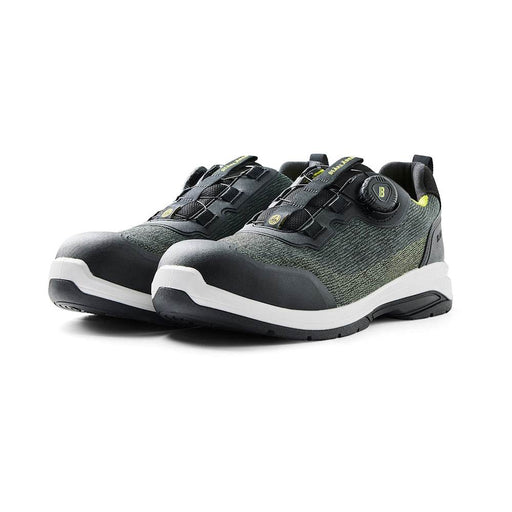 Pair of black and green shoes with white soles on a white background