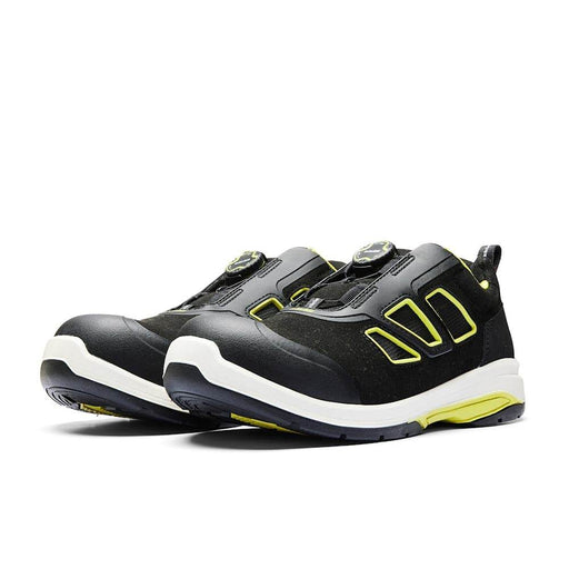 Black safety shoes with yellow accents on a white background