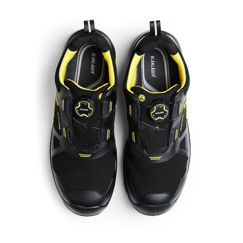 Black and yellow safety shoes with Blaklader branding on a white background