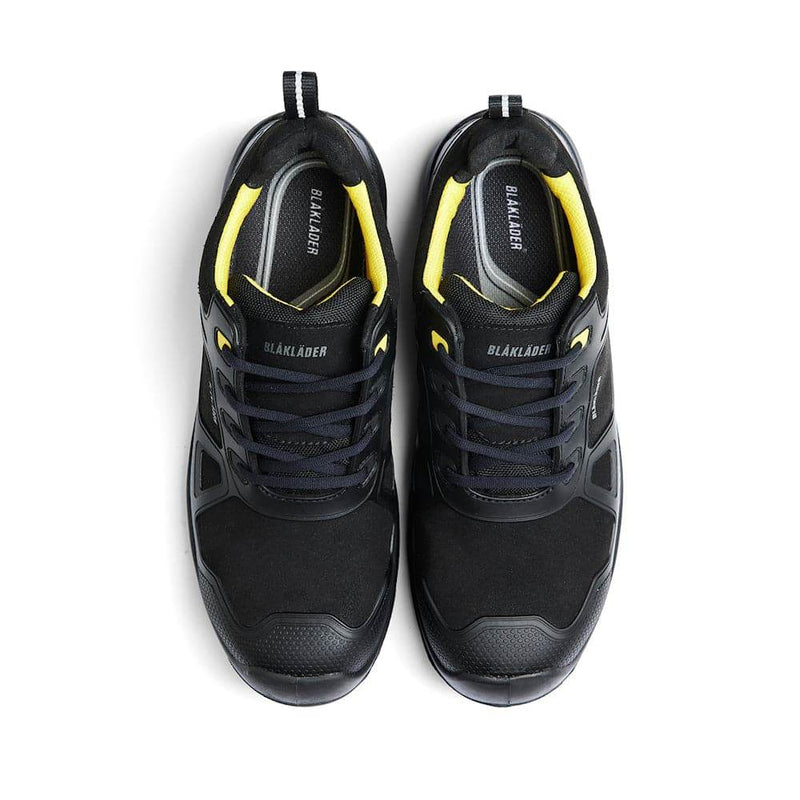 Black and yellow safety shoes with Blaklader branding on a white background