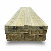 Stack of wooden 4x2 planks on a white background