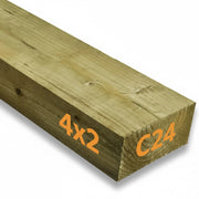 Wooden beam with dimensions '4x2' and 'C24' printed on it against a white background