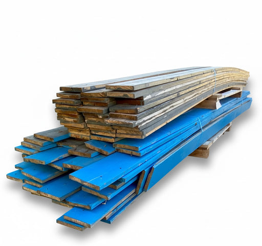 Stack of blue and brown wooden planks for sale sheppey on a white background