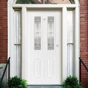 White front door with glass panels on a brick building